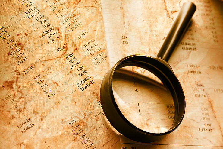Budget And Magnifying Glass