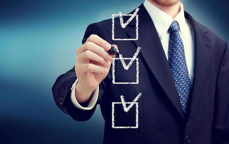 Business Man With Checkboxes