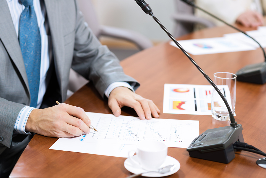 Businessman writing on  paper notes