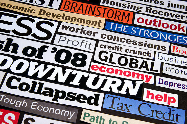 Newspaper and magazine headlines detailing the economic recessio