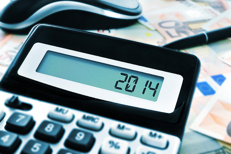 number 2014, as the new year, on the display of a calculator