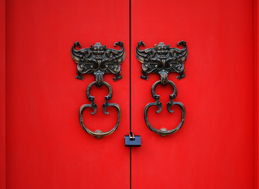 bat knocker on red door