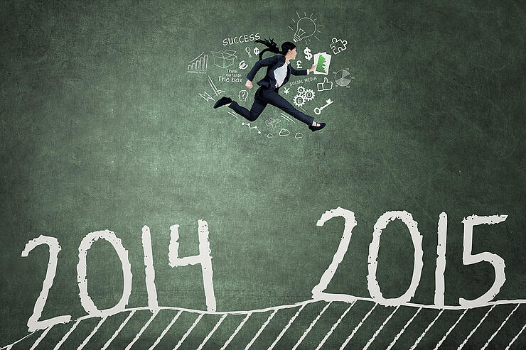 Young Worker Leaps Through Number 2014 To 2015